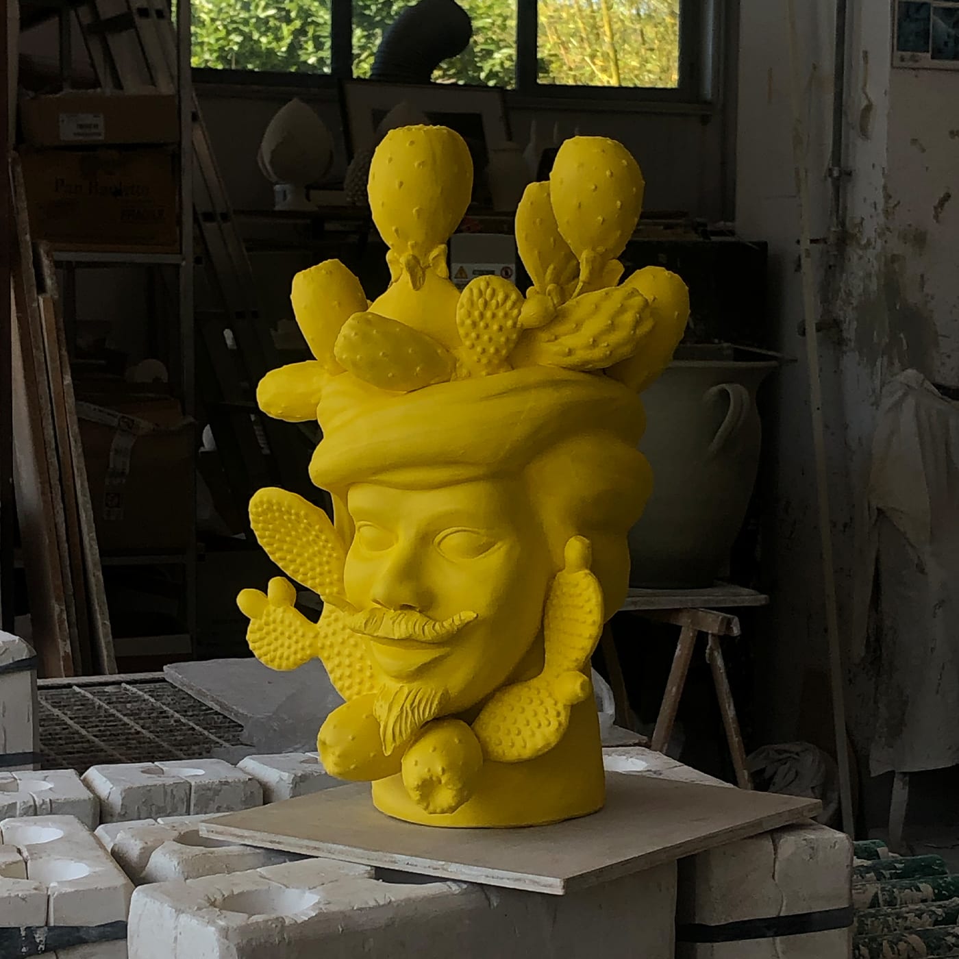 Unique Yellow Moor's Head Handcrafted Sculpture